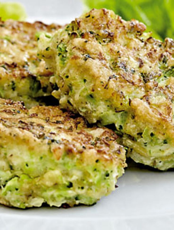 broccoli patties on a white plate with lettuce