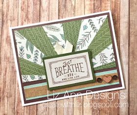 a close up of a greeting card on a wooden surface with the words, god's breath and live life