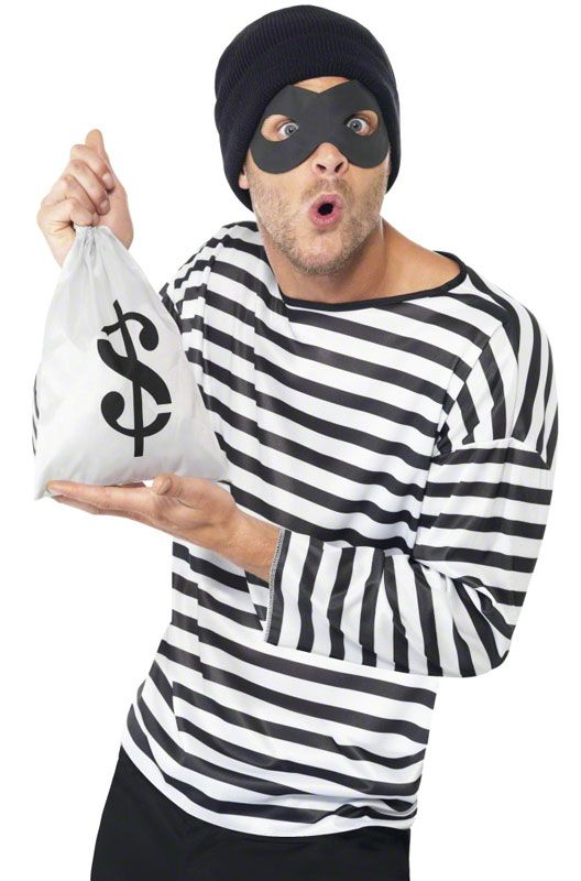 a man wearing a black and white striped shirt holding a bag with a dollar sign on it