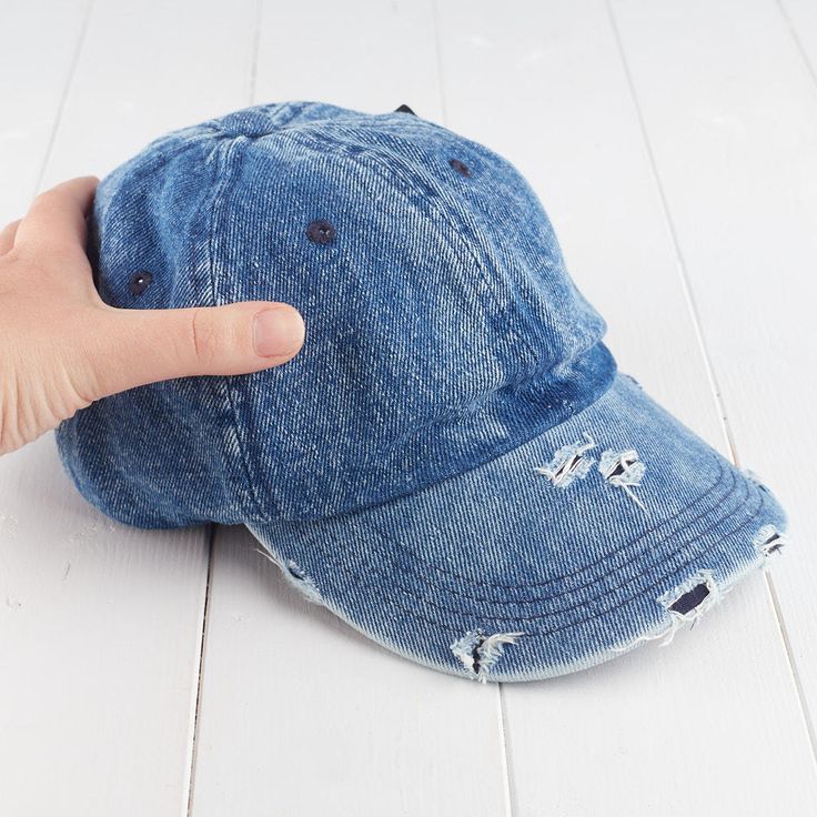 Light Denim Ripped Look Hat. Whether you are wanting a hat to dress up, or just to simply keep the sun out of your eyes this Light Denim Ripped Look Hat is just right for you. Trendy Distressed Adjustable Dad Hat, Trendy Distressed Dad Hat, Casual Hats For Spring, Trendy Washed Snapback Hat, Trendy Washed Hat, One Size, Trendy Washed Hat One Size Fits Most, Trendy Washed Hat, Distressed Medium Wash Adjustable Hat, Trendy Washed Baseball Cap