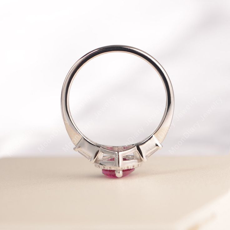 All HANDMADE ITEMS SHIP IN APPROX 8 DAYS Main Stone: Lab created ruby Main Stone Size: Heart cut 6 mm x 6mm Main Stone Weight: 1.16 carat Side Stone: CZs Height From The Ring Setting Bottom(to gemstone top): about 5.25 mm Width of Ring band Measure: gradually varied,about 2.08 to 2.31 mm Material: .925 Sterling Silver/14K White Gold/14K Yellow Gold/14k Rose Gold Engraved: Available For FreeNo more than 13 letters) Customized:Of course! Tell me what you want Includes With Order: All of my store i Pink Round Cut Ruby Ring For Anniversary, Pink Ruby Birthstone Ring, Pink Heart Ring With Brilliant Cut, Formal Ruby Ring For Valentine's Day With Round Cut, Pink Lab-created Ruby Ring For Gift, Pink Lab-created Ruby Ring Gift, Cubic Zirconia Ruby Ring For Valentine's Day Anniversary, Ruby Bezel Setting Ring For Anniversary, Halo Setting Round Jewelry For Valentine's Day