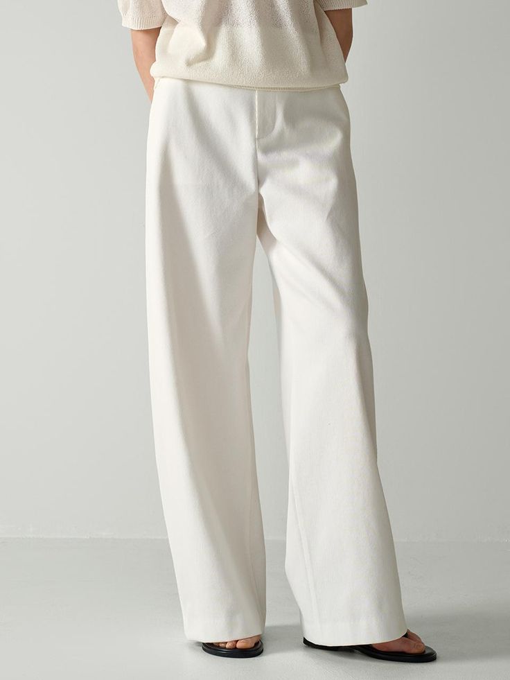 This is FACADE PATTERN’s clean-cut pants with a wide-straight silhouette, crafted from cotton fabric, exuding a sophisticated and neat impression. With a high-waisted fit, they snugly fit the waistline while the wide leg silhouette elongates the legs, creating a more flattering look. The addition of stitching on the side seams and back pockets adds dimension to the silhouette, giving off a casual vibe. These pants pair well with any top and can be effortlessly styled with basic t-shirts for a chic ensemble.- Ideal for daily wear.- Can be paired with various styles of tops to create different looks.- One back pocket features a welt pocket, while the other is designed with a flap pocket.- The soft touch fabric ensures comfortable wear Facade Pattern, Basic T Shirts, Twill Pants, Clean Cut, Flap Pocket, Welt Pocket, Cotton Twill, Casual Pants, Daily Wear