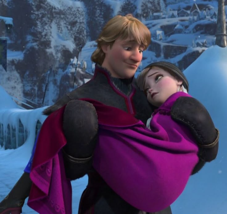 an animated image of a man and woman hugging in the snow with mountains behind them