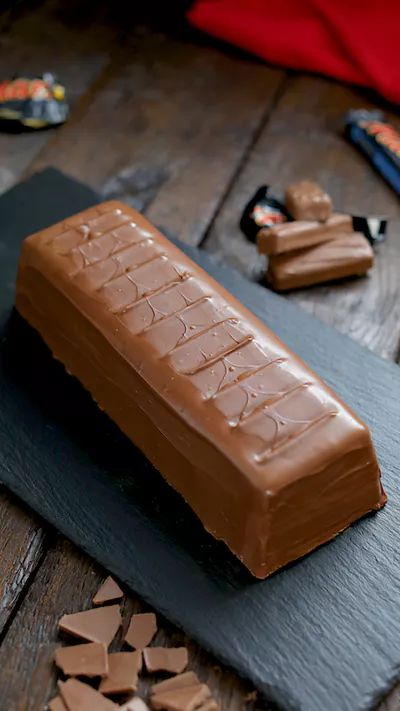 a chocolate bar sitting on top of a wooden table