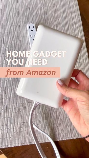 someone is holding an electronic device with the words home gadget you need from amazon