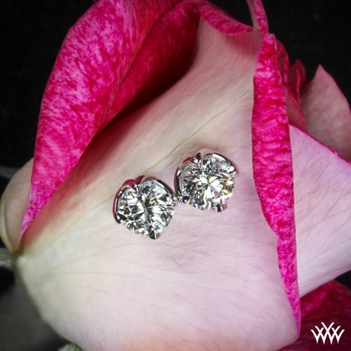 Sleek and stunning, the "W-Prong" Diamond Earrings are the perfect addition for any jewelry enthusiast. The criss-cross W-Prong design sweeps together to form an exquisite housing for a Diamond. Luxury Tension Setting Earrings For Anniversary, Luxury Earrings With Tension Setting For Anniversary, Elegant Wedding Diamond Earrings With Tension Setting, Elegant Diamond Earrings For Anniversary With Tension Setting, Diamond Earrings With Tension Setting For Anniversary, White Gold Diamond Earrings With Tension Setting For Anniversary, Fine Jewelry Diamond Earrings With Tension Setting For Anniversary, Diamond White Wedding Earrings Tension Setting, Diamond White Tension Setting Wedding Earrings