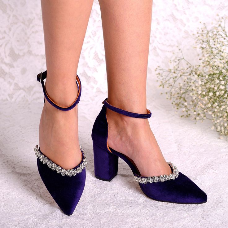 Make a statement on your special day with these exquisite dark purple wedding shoes. Handmade and embellished with crystals, these purple block heel bridal shoes feature a chic ankle strap design and luxurious dark purple velvet material. Elevate your bridal look with the elegant and timeless "FIONA" ankle strap pumps. *   Heel height measures: 6cm/2.36inches & 8cm/3.15inches (pictured) *   Fit : Normal *   Exterior: Velvet *   Interior: Genuine Leather  *   Handmade in Greece *   Made to order Purple Velvet Wedding, Block Heel Wedding Shoes, Dark Purple Wedding, Purple Wedding Shoes, Velvet Block Heels, Velvet Wedding, Evening Heels, Purple Heels, Bridal Heels