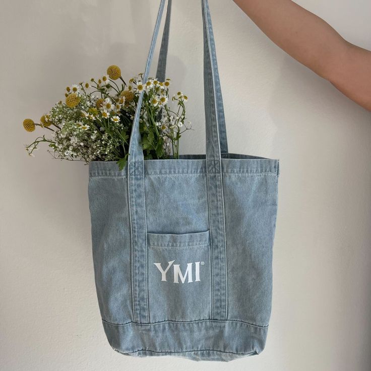 This essential carryall tote bag is just what you need this season! 💙 Style: YMIDB02-LTDWH Denim Blue Cotton Bag With Adjustable Strap, Denim Blue Cotton Bags For Spring, Spring Cotton Shoulder Bag For School, Cotton School Bags For Spring, Spring School Cotton Bags, Denim Blue Cotton Shoulder Bag For School, Denim Blue Rectangular Canvas Bag For School, Denim Blue Cotton Canvas Bag For School, Spring Denim Blue Cotton Shoulder Bag