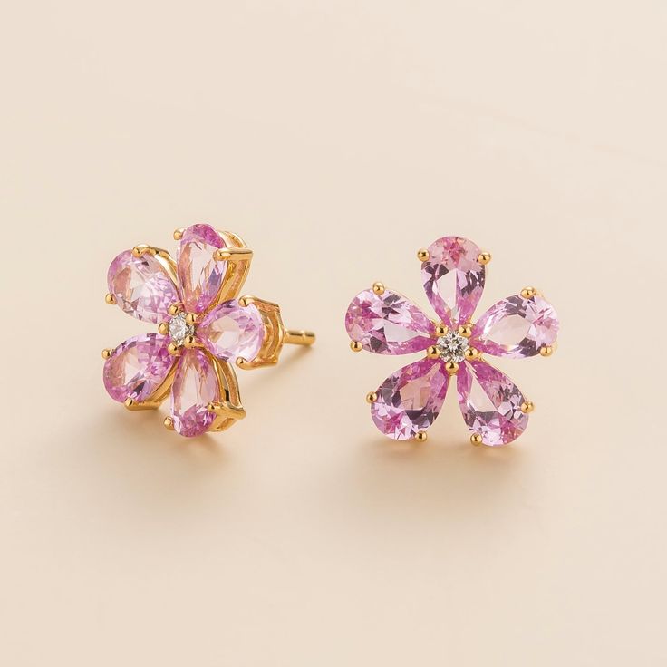 Florea earrings in 18K gold vermeil set with Pink sapphires and Diamonds. Pink sapphire: ~5. 0 carats (10 of 6mm x 4mm pear) Diamond VS+ grade: ~0. 1 carats (2 of 2mm VS round) Each earring dimension: 13. 1mm height x 13. 4mm width x 3mm depth. Options available in 9K, 14K and 18K gold and additional sizes available, please contact Juvetti. Flower of happiness blooms from within. Our precious jewellery is designed to preserve its original brilliance over time. There are a few precautions to make Luxury Pink Sapphire Earrings As Gift, Luxury Pink Sapphire Earrings For Gift, Gold Pink Sapphire Earrings Fine Jewelry, Gold Pink Sapphire Earrings In Fine Jewelry Style, Rose Gold Pink Sapphire Earrings As Gift, Rose Gold Pink Sapphire Earrings For Gift, Pink Sapphire Round Earrings As Gift, Fine Jewelry Pink Sapphire Earrings In Yellow Gold, Elegant Pink Sapphire Earrings With Prong Setting