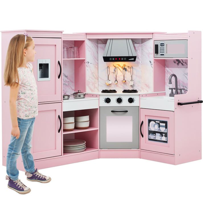 IMAGINATIVE PLAY: Interactive elements like a play oven and sink, along with a battery-powered, light-up range hood and matching ice maker, help your child set the scene for their kitchen adventures PLAY-FRIENDLY MATERIALS: MDF and metal components provide a durable and reliable play space for your children to pretend cook and bake in a unique and stylish kitchen layout TRUE-TO-LIFE STOVETOP AND HOOD: Small details bring this playset to life! All knobs click when turned, and pretend burners on the stove automatically light up when the included pot and pan are placed on top! AMPLE STORAGE: Open storage in the fridge, pantry, oven, and sink shelves provide ample space for your child's favorite play accessories from other kitchen sets or stuffies to enjoy their cooking ASSEMBLY INFORMATION: G Pantry Oven, Pink Play Kitchen, Kitchen Playsets, Toy Kitchens, Fridge Pantry, Play Corner, Kitchen Sets For Kids, Kids Play Set, Sink Shelf