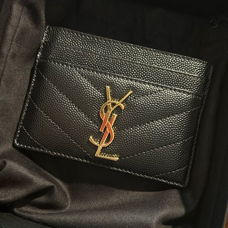 Card Holder Decorated With The Cassandre And Chevron-Quilted Overstitching. 4x2.8” Ysl Card Case In Perfect Condition. Like Brand New. Luxury Black Card Holder, Ysl Passport Case, Ysl Document Holder, Ysl Card Holder, Fall Leather, Saint Laurent Bags, Yves Saint Laurent Bags, Leather Travel, Card Case