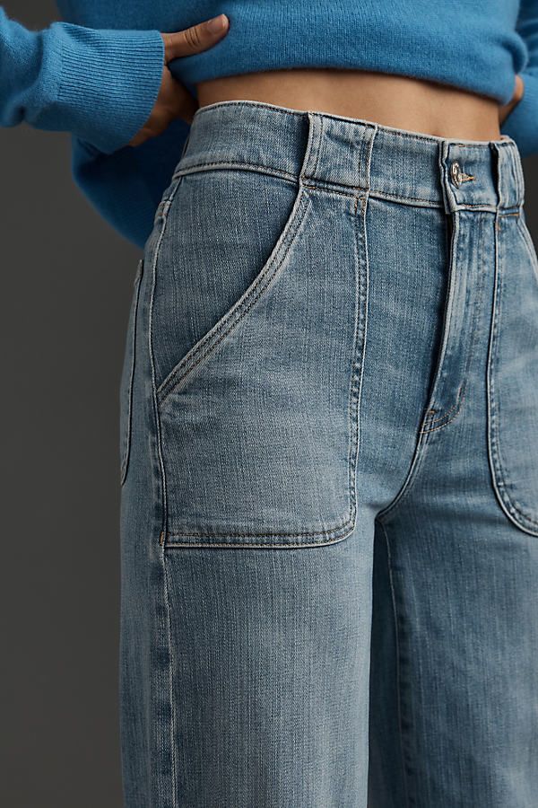 Denim, decoded: This fall, we’re digging denim in every corner of our closet – like the FRAME Modern Pocket Jeans, featuring utility-inspired pockets, a high-rise, and a floor-length wide-leg. | Modern Pocket High-Rise Wide-Leg Jeans by FRAME in Blue, Women's, Size: 26, Polyester/Cotton/Elastane at Anthropologie Utility Flare Jeans With Patch Pockets For Fall, Fall Utility Style Denim Flare Jeans, Mid-rise Cargo Jeans With Patch Pockets For Everyday, Everyday Mid-rise Cargo Jeans With Patch Pockets, Everyday Cargo Jeans With Cropped Leg, Fall Utility Flare Jeans In Medium Wash, Fall Utility Style Medium Wash Flare Jeans, High Rise Utility Flare Jeans For Fall, High-rise Cargo Jeans With Pockets For Everyday