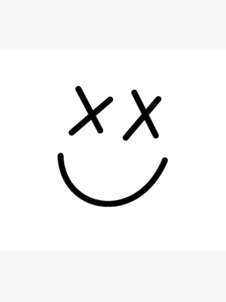 a smiley face with two crosses drawn on it