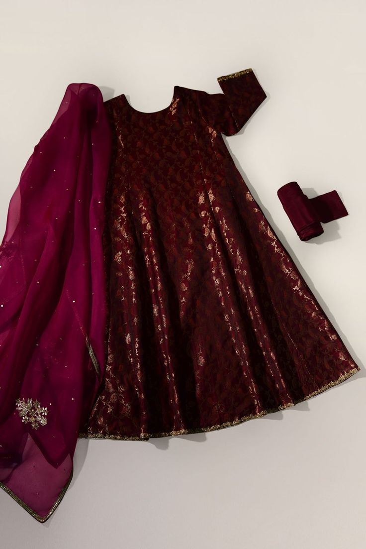 An enchanting three piece with a heavily embellished neckline in intricate zardosi craftmenship done by our expert artisans on an alluring plum brocade canvas. The pure organza dupatta is adorned with handwork motifs, paired with a matching chooridar. Turn heads in “ Plum Brocade “ on your celebratory events. The lengt Purple Churidar With Intricate Embroidery, Wedding Anarkali Unstitched Brocade Suit, Festive Brocade Sets With Dabka Work, Elegant Brocade Dupatta With Dabka Work, Party Dupatta With Resham Embroidery In Brocade, Brocade Dupatta With Intricate Embroidery For Party, Brocade Dupatta With Resham Embroidery For Party, Designer Brocade Salwar Kameez With Intricate Embroidery, Elegant Brocade Churidar With Zari Work