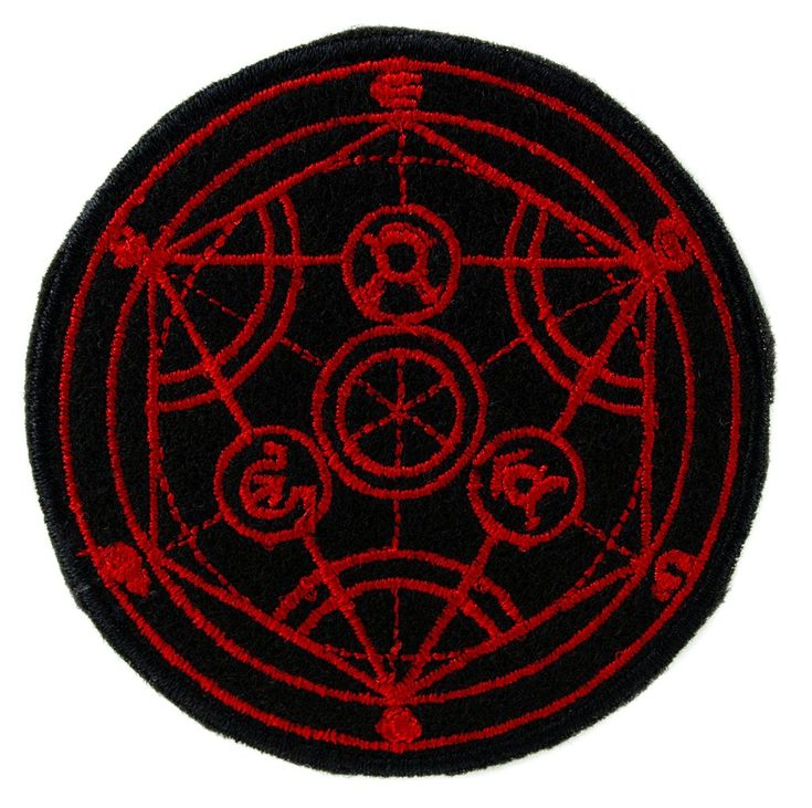 a black and red patch with an image of five circles in the center on it