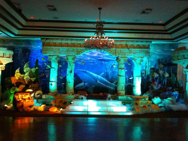 an underwater themed stage set up for a party