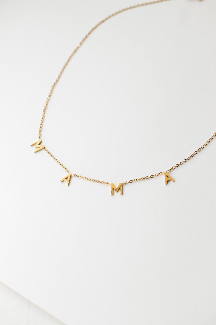 Time to celebrate YOU, Mama! Our MAMA Necklace is made of 18k gold plated stainless steel which means it's EXTREMELY tarnish proof, hypoallergenic, and suitable for even the most sensitive skin! It's a great necklace for everyday wear and is gorgeous worn alone or in layers! This would also be so great for a gift.... (wink wink) ;) This necklace is 15.5 inches, and adjustable up to 17.5 inches in length. Adjustable Stainless Steel Name Necklaces, Adjustable Stainless Steel Necklaces With Name, Adjustable Stainless Steel Name Necklace, Custom Name Stainless Steel Necklaces For Everyday, Custom Name Stainless Steel Necklace For Everyday, Minimalist Stainless Steel Name Jewelry, Yellow Gold Stainless Steel Jewelry For Mother's Day, Mother's Day Yellow Gold Stainless Steel Jewelry, Everyday Stainless Steel Necklace For Mother's Day