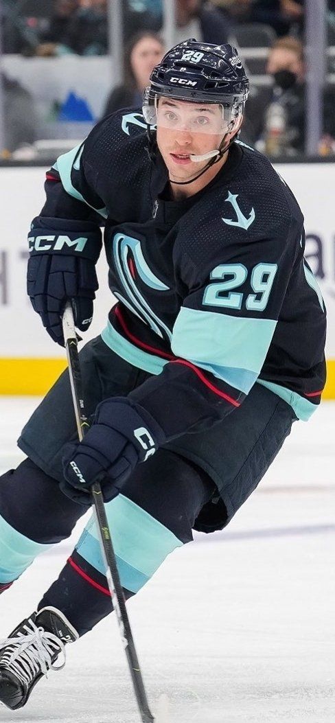 a hockey player is skating on the ice