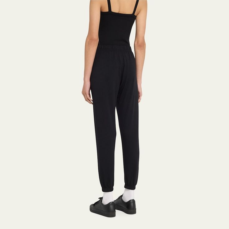 Splits59 "Sonja" joggers are crafted from a cozy fleece fabric  High rise Drawstring waistband  Cropped at the ankle Easy fit Elasticized cuffs Pull-on style  Modal/spandex Made in USA Athleisure Sweatpants With Logo Waistband, Logo Waistband Athleisure Sweatpants, Athleisure Elastane Trousers, Sporty Joggers With Cuffed Ankles, Comfort Stretch Pull-on Ankle-length Sweatpants, Cozy Fit Jogging Bottoms With Ribbed Cuffs, Comfort Stretch Ankle-length Pull-on Sweatpants, Casual Black Sweatpants With Logo Waistband, Stretch Elastane Sweatpants For Jogging