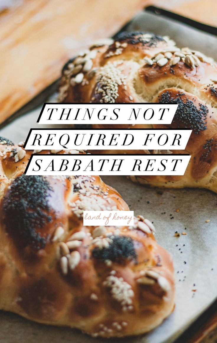 two hot cross buns sitting on top of a baking sheet with the words, things not required for sabath rest