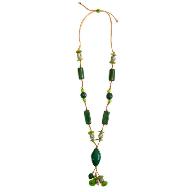 Unleash your creativity and embrace the playful spirit with the Alya Necklace. This long, adjustable necklace is a delightful fusion of unique tagua shapes, pambil, bombona seeds, and vibrant acai berries, making it the perfect accessory for retailers seeking a fun and imaginative piece that adds a burst of color and whimsy to any ensemble. Adjustable 34"-48" L Materials: Sustainable Tagua nut, Bombona seeds, Pambil, Acai Berries Faux Leather Cord Organic Vegetable dyes Handmade in Ecuador Due to the nature and size of the tagua nuts, all sizes are approximate...not exact. Colors may vary from the pictures slightly due to the nature of the Tagua Nut. Tagua Jewelry, Tagua Nuts, Acai Berry, Adjustable Necklace, Leather Cord, Ecuador, Halloween Shopping, Necklace Etsy, Seeds