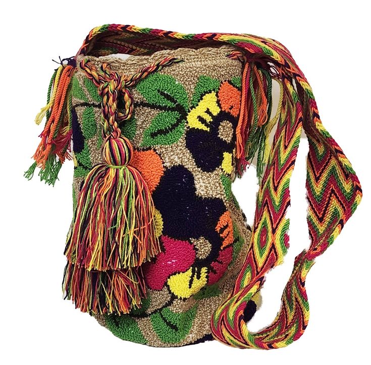 a multicolored purse with tassels and fringe