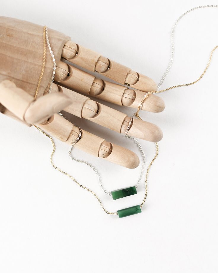 "Last day to order is 12/12! Orders placed before this date will be estimated to arrive before Christmas.  𝗘𝗮𝘀𝘆 𝗧𝗼 𝗦𝘁𝘆𝗹𝗲, 𝗠𝗮𝗱𝗲 𝗧𝗼 𝗟𝗮𝘀𝘁 Our dainty jade gemstone necklaces are easy to layer and ready to be worn on repeat! Created to last a lifetime, these necklaces will remain evergreen even as the years and trends come and go. 𝗠𝗮𝘁𝗲𝗿𝗶𝗮𝗹𝘀 𝗪𝗲 𝗨𝘀𝗲 This necklace is made entirely with sturdy 14k yellow gold filled or sterling silver pieces and a genuine gemstone pendant. It is safe to wear in the shower, but we recommend avoiding prolonged exposure to chemicals like chlorine to keep your necklace like new! Our African jade gemstones are not dyed or artificially colored in any way. Their colors are completely genuine! 𝗟𝗲𝗻𝗴𝘁𝗵 𝗢𝗽𝘁𝗶𝗼𝗻𝘀 We have lengths b Minimalist Jade Jewelry For May Birthstone, Green Delicate Chain Jewelry For Everyday, Minimalist Jade Jewelry, Minimalist Green Jewelry For Everyday Wear, Green Jewelry With Delicate Chain For Layering, Green Minimalist Necklace For Everyday, Everyday Minimalist Green Necklace, Green Minimalist Everyday Necklace, Jade Necklaces