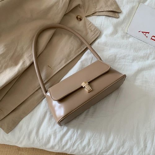 SPECIFICATIONSTypes of bags: Shoulder HandbagsStyle: vintageShape: BaguettePlace Of Origin: GUANG DONG ProvincePlace Of Origin: GUANG DONG ProvincePattern Type: SolidOrigin: CN(Origin)Occasion: VersatileNumber of Handles/Straps: SingleModel Number: 69633Main Material: PULining Material: PolyesterInterior: No PocketHardness: SoftHandbags Type: Shoulder BagsGender: WOMENClosure Type: COVERCN: GuangdongBrand Name: DKQWAIT Retro Handbags, Leather Tote Bag Women, Small Shoulder Bags, Trendy Shoulder Bag, Women Crossbody Bag, Simple Leather, Underarm Bag, Mini Handbags, Handbags For Women