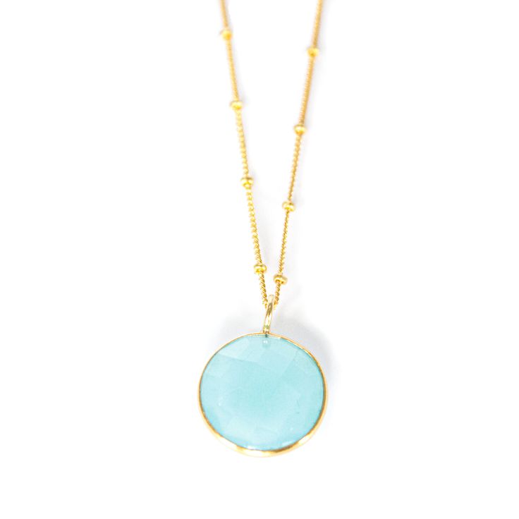 Our beautiful Hannah necklace is simple yet elegant. You can dress up or down with any of our other pieces of jewellery.   Each stone is organically cut and unique, with no two stones looking the same making each jewellery very special.    This Aqua Chalcedony stone is known to be a sacred stone to the Native Americans, using it to promote stability during their ceremonial activities. It is still in use today for meditations.  The Aqua Chalcedony is associated with the throat chakra. This stone is believed to help with stage fright and public speaking. 14k Gold Vermeil Sterling Silver Aqua Chalcedony Gemstone Size of stone 16mm diameter  All of our stones are natural and ethically sourced.  Our jewellery is presented in a gorgeous green and gold box. Modern Gemstone Round Necklace, Modern Round Gemstone Necklace, Delicate Round Necklace With Natural Stones, Delicate Round Natural Stones Necklace, Delicate Round Natural Stone Necklace, Yellow Gold Chalcedony Necklace As Gift, Large Stone Round Necklace, Round Necklaces With Large Stone, Elegant Chalcedony Gemstone Necklace