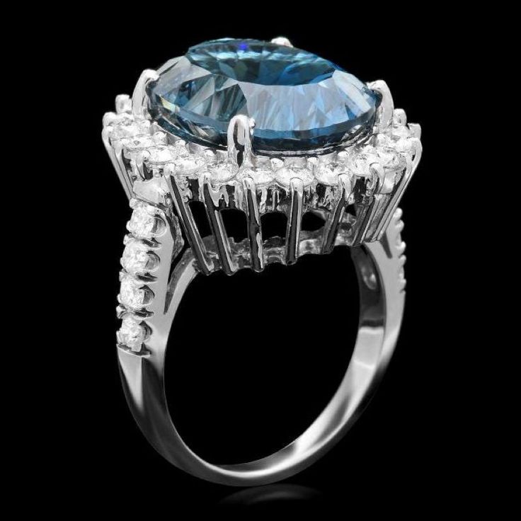 12.50 Carats Natural Blue Topaz and Diamond 14K Solid White Gold Ring Total Natural Blue Topaz Weight is: Approx. 11.00 Carats Blue Topaz Measures: Approx. 16.00 x 12.00mm Natural Round Diamonds Weight: Approx. 1.50 Carats (color G-H / Clarity SI1-SI2) Ring total weight: Approx. 9.3 grams Disclaimer: all weights, measurements and colors are approximate and may vary slightly from the listed dimensions or as seen in the image. All pictures are magnified to show the smallest of details. Please, ref Luxury Blue Topaz Ring In Platinum, Formal Aquamarine Diamond Ring With Brilliant Cut, Aquamarine Brilliant Cut Diamond Ring For Formal Occasions, Formal Blue Brilliant Cut Gemstones, Formal Aquamarine Diamond Ring With Prong Setting, Blue Brilliant Cut Gemstones For Formal Occasions, Formal Gia Certified Diamond Topaz Ring, Aquamarine Diamond Ring With Halo Setting For Formal Events, Luxury Blue Gemstones For Formal Occasions