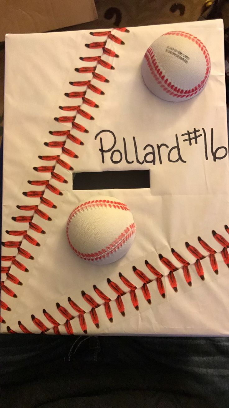 a sign with two baseballs on it