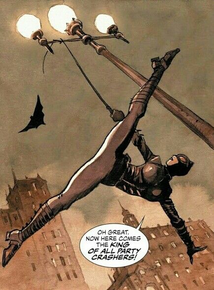 a comic book cover with an image of a woman hanging upside down on a pole