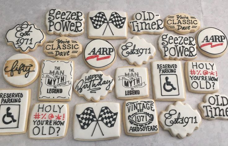 decorated cookies are arranged on a table