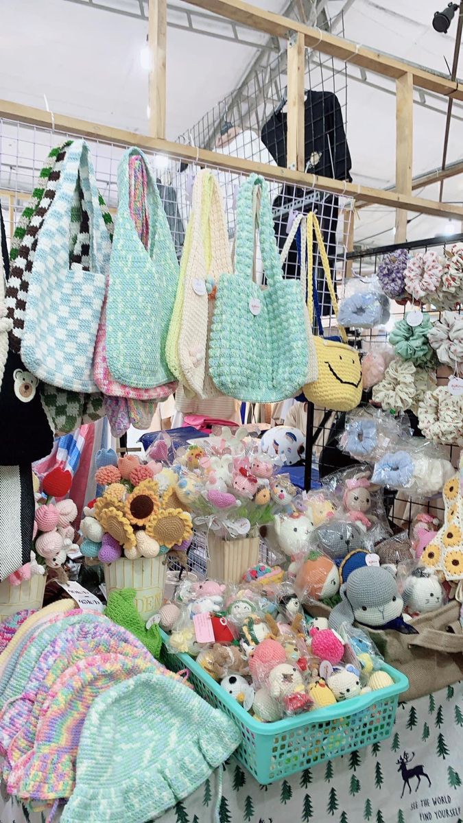 there are many stuffed animals on display at this market