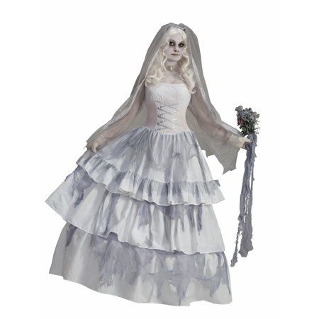 a doll dressed in white and holding a knife