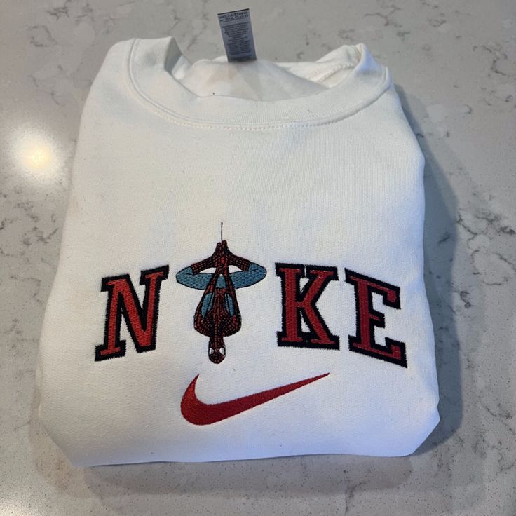 Not Nike Brand Please Allow Up To A Week To Ship Design Size Is 7x5 -Unisex Sizing True To Fit -Embroidered Design -Use Gildan Brand For Crewnecks, However There May Be A Substitute For A Similar Brand -Available In S, M, L, Xl, 2xl Size Of Design Is The Same For All Sizes Of Crewnecks So Design Will Look Smaller On A 2xl Compared To A S Material Is 50/50 Cotton/Polyester *Colors May Vary Slightly* Spiderman Crewneck, Nike Spiderman, Spiderman Graphic, Spiderman Outfit, Vintage Nike Sweatshirt, Ship Design, Cute Nike Outfits, Embroidered Nike, Diy Sweatshirt