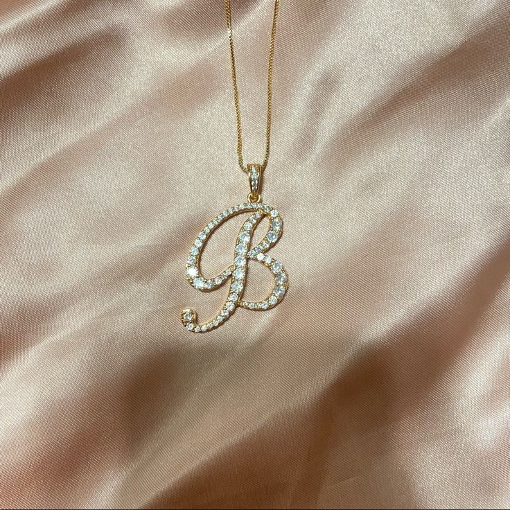 Gold Rhinestone Initial Necklaces With A Lobster Clasp Closure. Cz (Cubic Zirconia) Pave Pendent Necklace With A Fully Embellished Letter. All Rhinestones Are Intact. Necklace Length Measurement 18.5”-21”. More Letters Available!!! Doesn’t Come In A Box. ***Also Available In Silver*** Approx Length: 22 Made In Korea B Pendant Necklace, Initial Pendant Necklace B, B Necklace Initial, Good Necklace Jewellery, Elegant Gold Iced Out Rhinestone Necklace, Initial Chain Letter Necklace, Letter I Necklace, Necklaces Everyday, Boyfriend Name Necklace