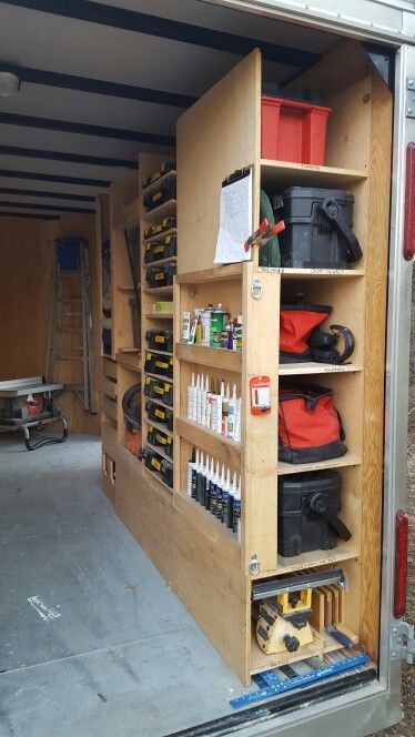 the inside of a storage unit with tools in it