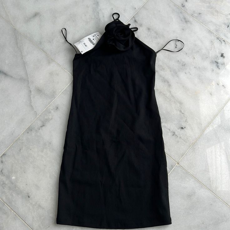 Zara Mini Black Dress With Flower Detail. Spring Formal Halter Neck Bodycon Dress, Elegant Black Halter Mini Dress, Black Formal Halter Dress For Summer, Formal Black Halter Dress For Summer, Black Spring Halter Dress, Chic Black Mini Halter Dress, Spring Black Halter Dress For Formal Occasions, Spring Formal Black Halter Dress, Black Casual Halter Dress For Spring