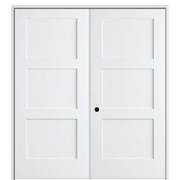 two white doors with black knobs on each side