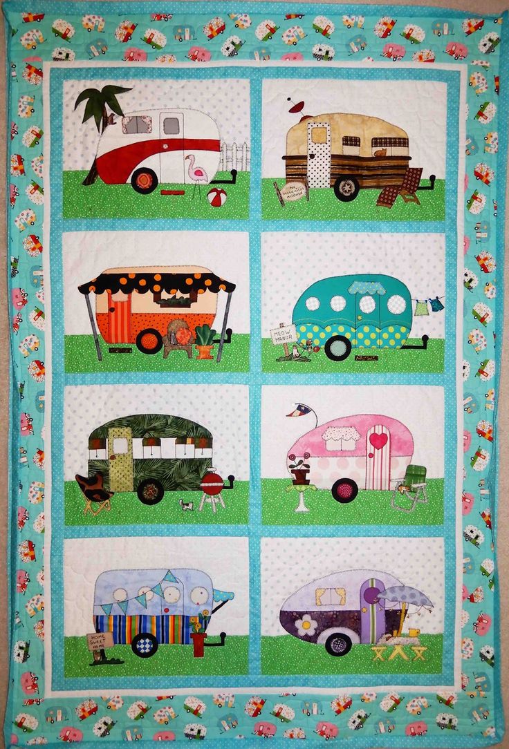 a quilted wall hanging with different types of rvs and campers on it