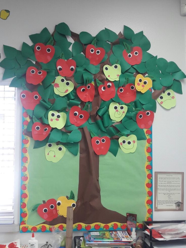 an apple tree made out of paper with apples on it