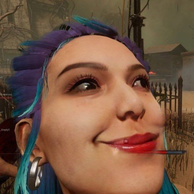 a woman with blue hair and piercings on her nose is looking up at the sky