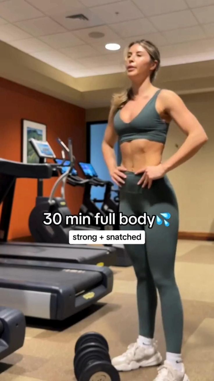 a woman standing in front of a gym machine with the words 30 min full body