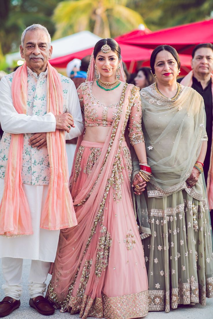 Happy Pictures Of Brides Walking Down The Aisle With Their Parents! | WedMeGood Party Dress Inspiration, Bride Entry, Brides Mom, Bride Pictures, Sari Dress, Indian Wedding Planning, Bridal Elegance, Bride Photography, Stylish Party Dresses