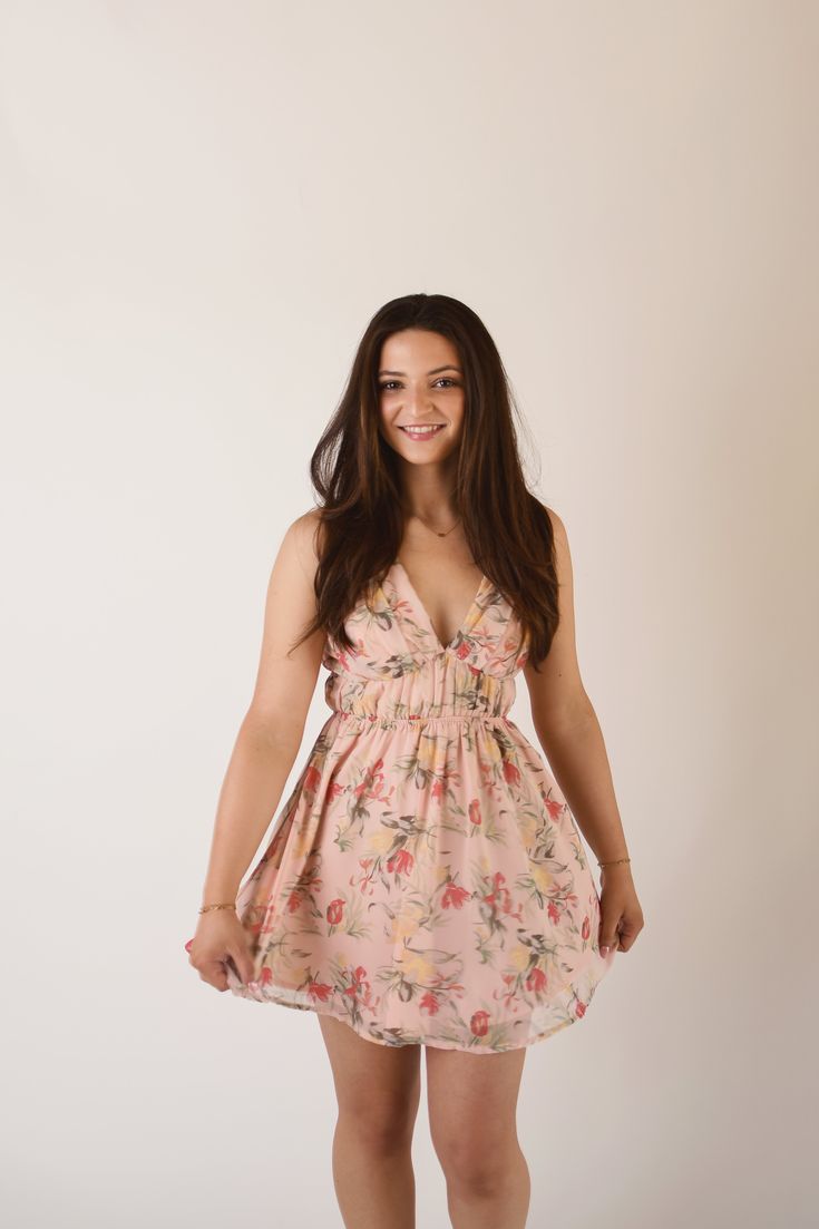 Enchant every eye with the absolutely dreamy ‘Spring Solstice Mini Halter Dress’ with a plunging neckline, adjustable ties, and delicate floral design. Cute is an understatement!This item fits true to size. Feminine V-neck Mini Dress With Tie Back, Flirty V-neck Floral Dress For Beach, Feminine Floral V-neck Dress For Date Night, Flirty V-neck Floral Dress For Vacation, V-neck Floral Sundress For Date Night, Floral V-neck Sundress For Date Night, Spring Solstice, Mini Halter Dress, New Tops