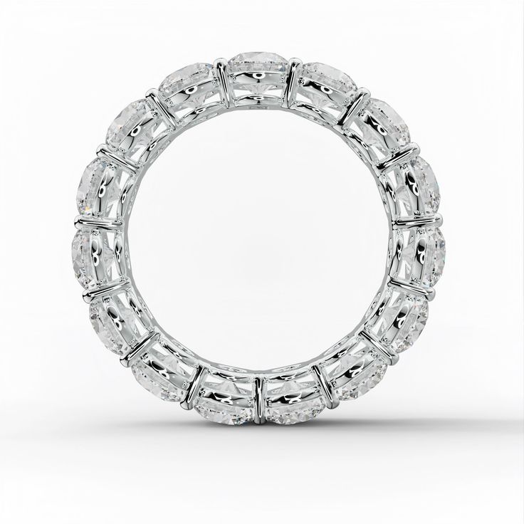 an oval shaped diamond ring on a white background