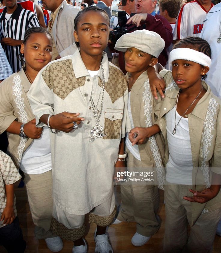 a group of young people standing next to each other