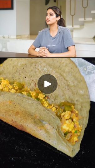 a woman sitting at a table in front of a tortilla