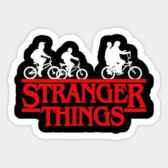 a sticker with the words,'strange things'in red and black on it